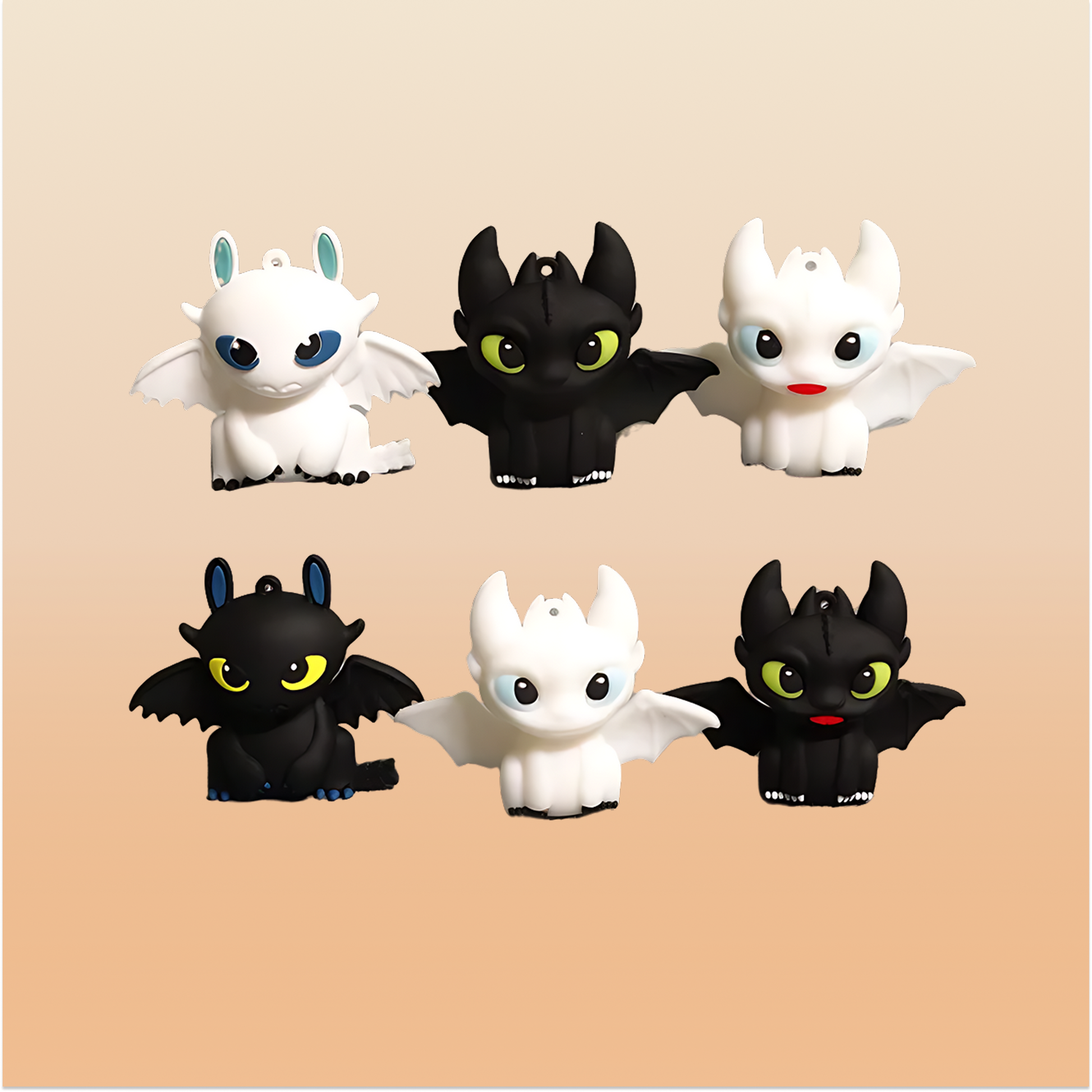 Set of black & white mini dragon figures on a neutral background